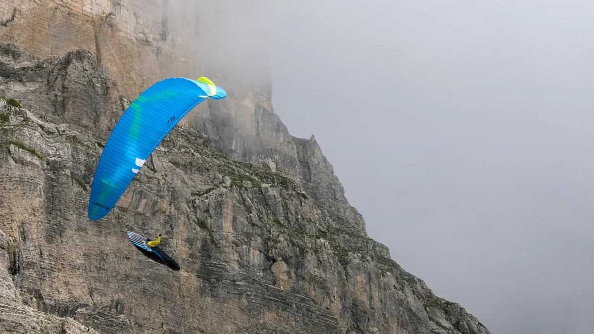 ozone-lyght-iwh-from-below-soaring-mountainside-into-cloud ozone-lyght-iwh-from-below-soaring-mountainside-into-cloud